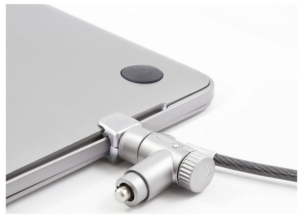 'A security cable lock attached to a laptop's locking port, ensuring device security on a white background.'