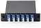 A black fiber optic adapter panel with six blue duplex LC ports, numbered 1 to 6, used for network connections.