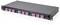 A black rack-mounted optical fiber patch panel with multiple magenta fiber connections for network cable management and organization.