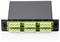 A black fiber optic terminal box with four green adapters on the front, each featuring four white connection ports, numbered 1 to 6.