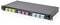 A black network patch panel with multiple colored ports for cable management.
