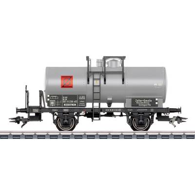 Model train of a gray tanker car on tracks, detailed with text and symbols.
