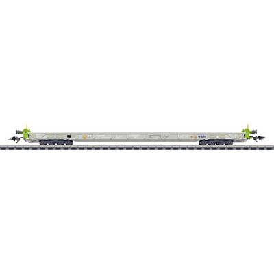 A futuristic transportation vehicle on tracks, featuring a sleek design with green accents and antennas on each end.
