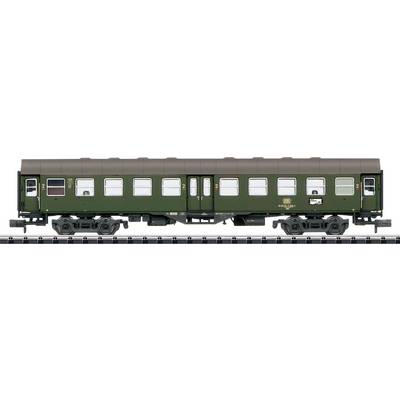 A model of a green train car with detailed windows and wheels on display track, showcasing vintage rail design.