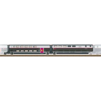 A high-speed train zooms along tracks, showcasing a sleek, modern design with two visible passenger cars and prominent windows.