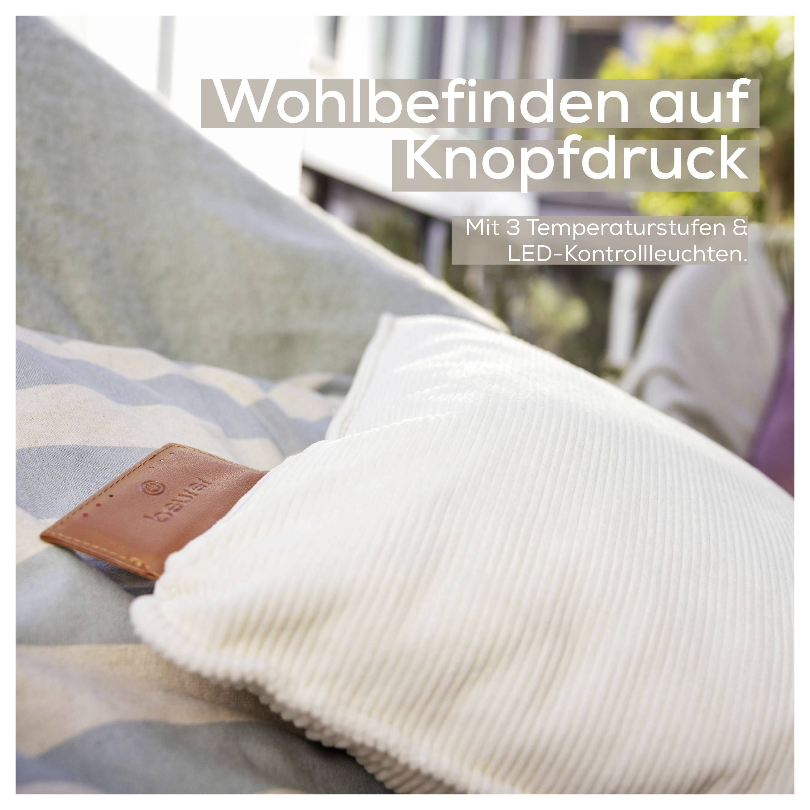 'A sense of well-being at the touch of a button. With 3 temperature levels & LED control lights.' White pillow on striped cloth.