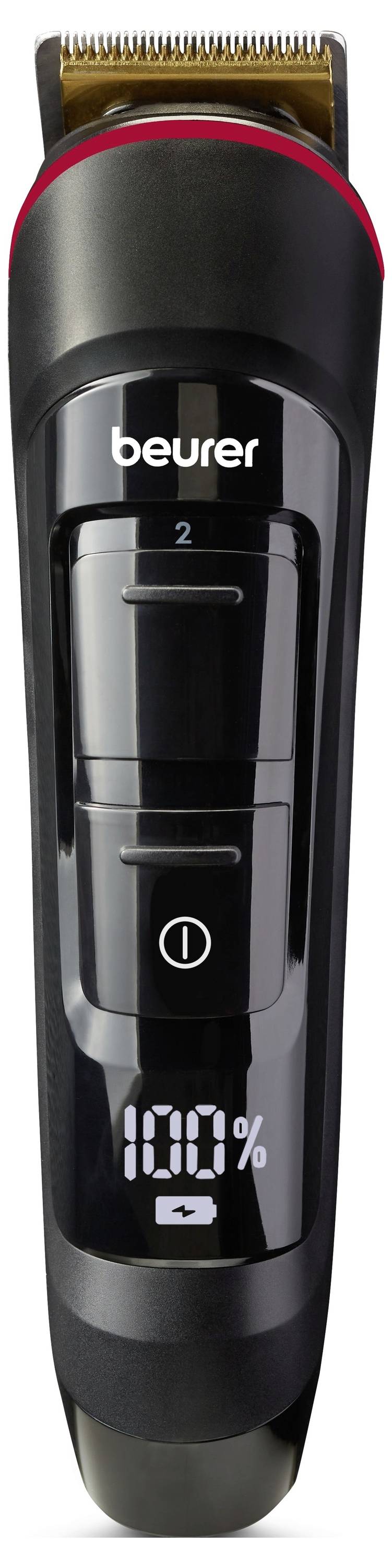 Electric hair trimmer with LCD displaying '100%' battery charge, featuring brand name 'beurer'.