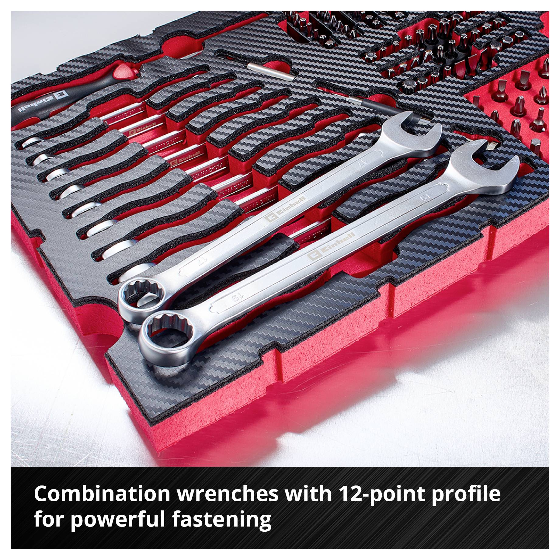 'Ring spanners with 12-point profile facilitate powerful tightening.' A set of ring spanners on a textured background.