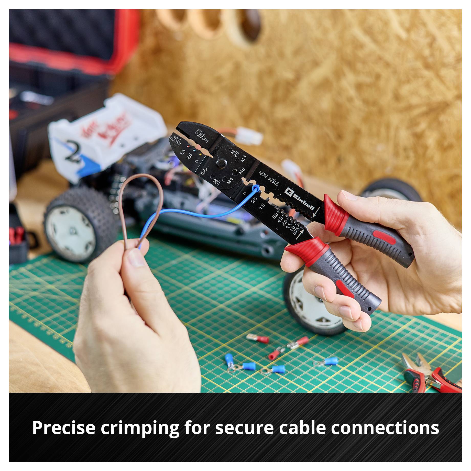 'A hand holds a wire and a crimping plier; in the background a model car. Text: Precise crimping for secure connection of conductors.'