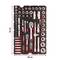 Toolkit with various sockets, ratchets, and accessories neatly organized on a black tray. The tray measures 42 cm by 28 cm.