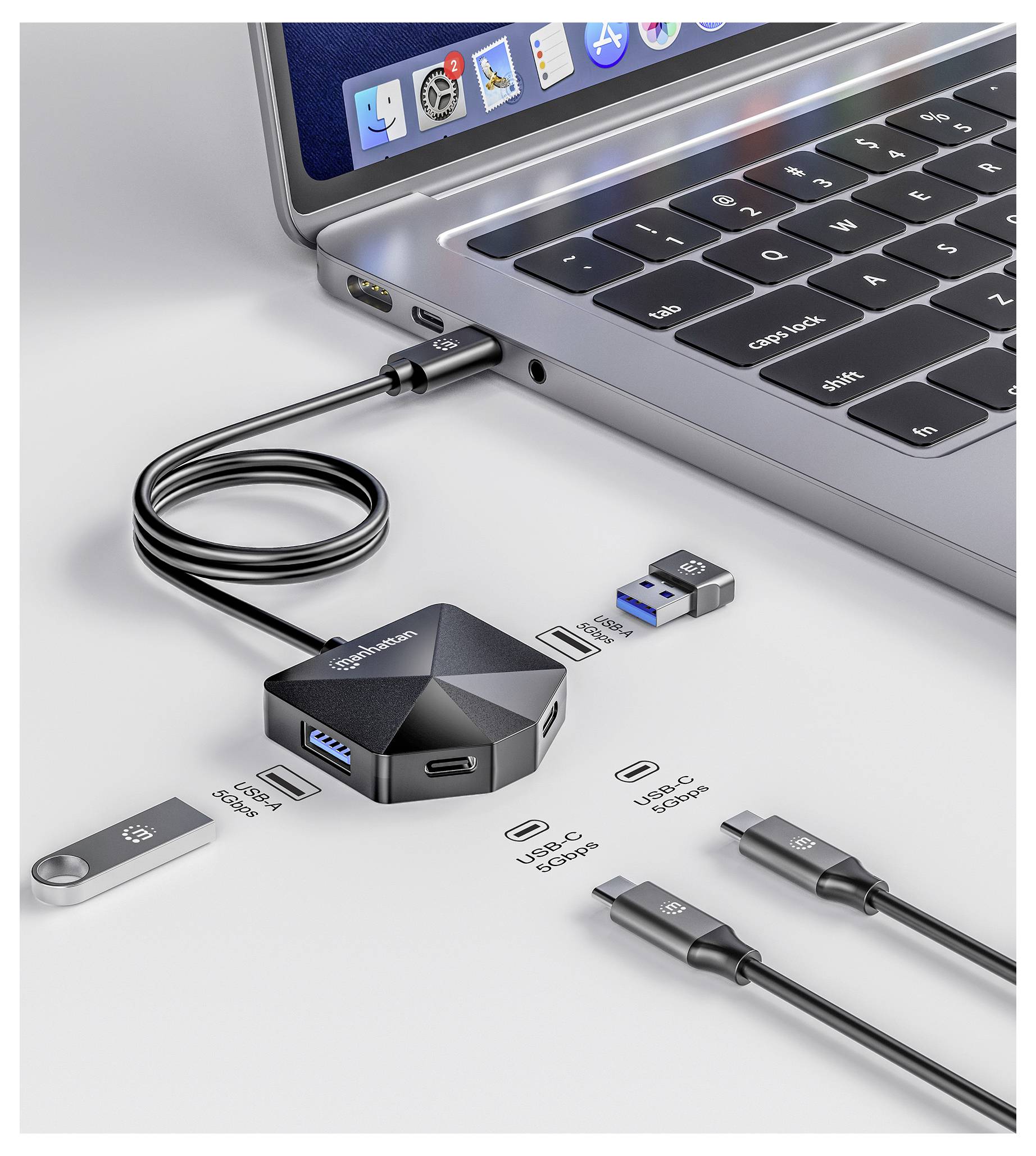 'QGeeM' USB-C hub connected to a laptop, featuring multiple ports: HDMI, USB 3.0, USB-C, SD card, for expanding connectivity options.