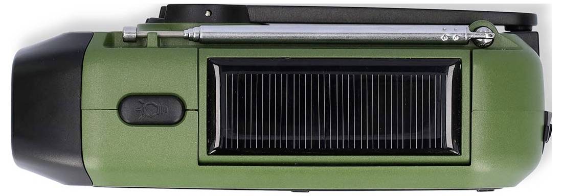 Green film camera viewed from the side, showing a solar panel and a winding knob.