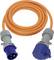 An orange extension cord with grey and blue connectors on each end, coiled in a circle, used for electrical connections.