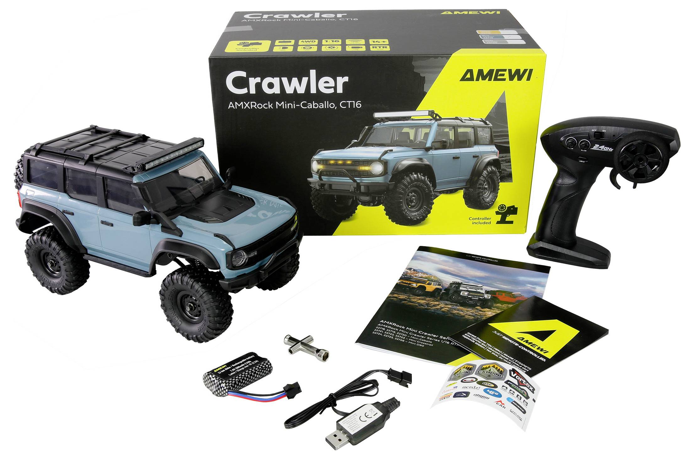 Model Crawler AMXRock Mini CT16 RC car set with remote controller, manuals, charger, and parts, packaged for display.