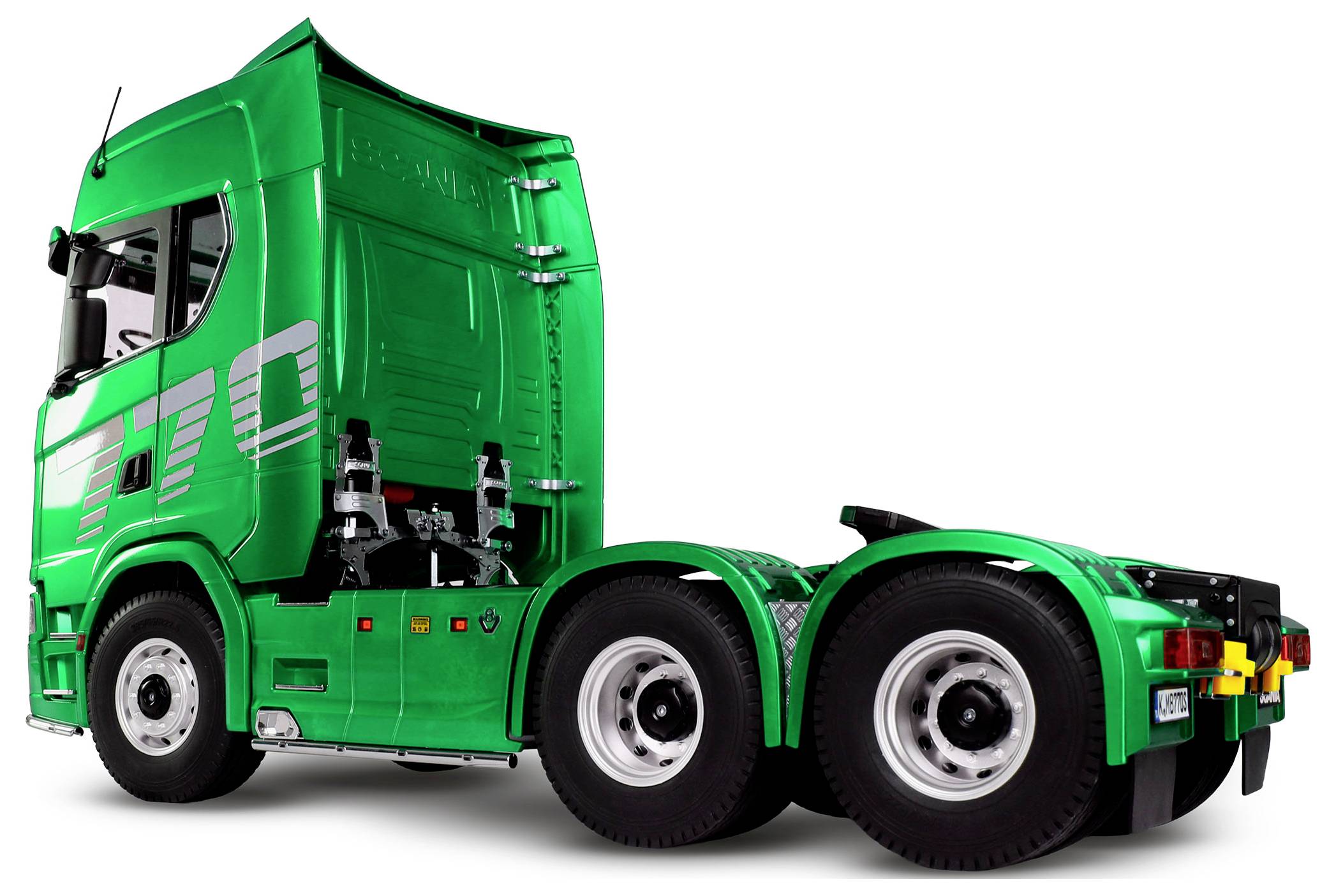 A green semi-truck cab showing the rear and driver's side view. The truck is sleek and modern, indicating heavy-duty capability.