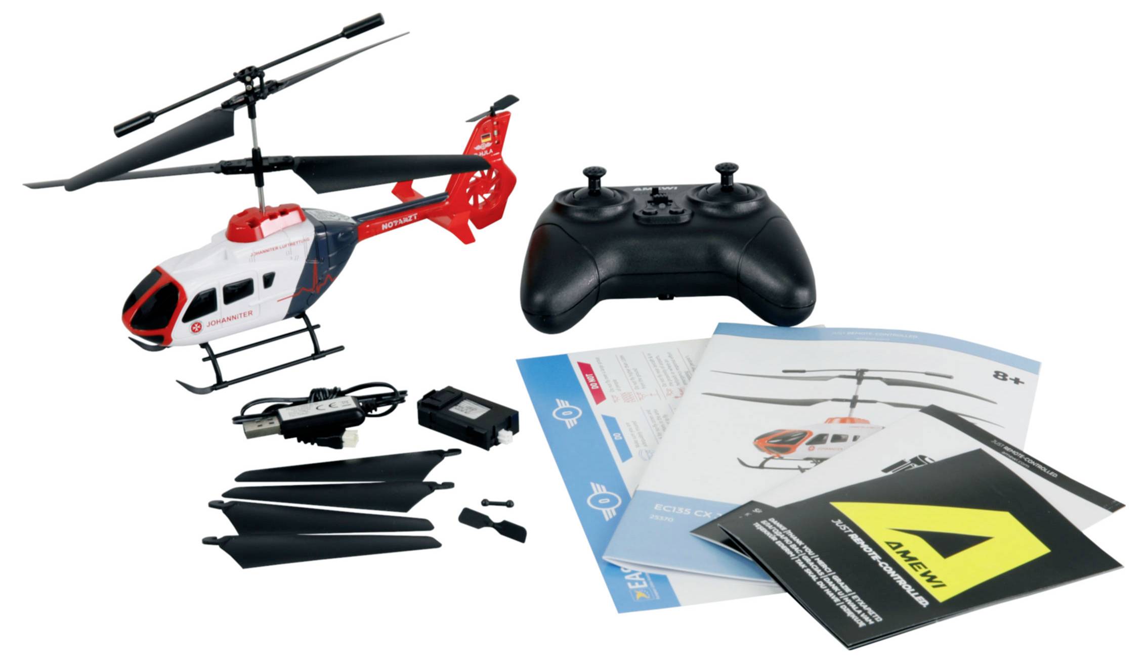 Remote control helicopter set with controller, spare propeller blades, charger, instruction manuals, and warranty card.