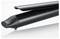 A sleek, black hair straightener with smooth plates, designed for styling hair, resting on a reflective white surface.