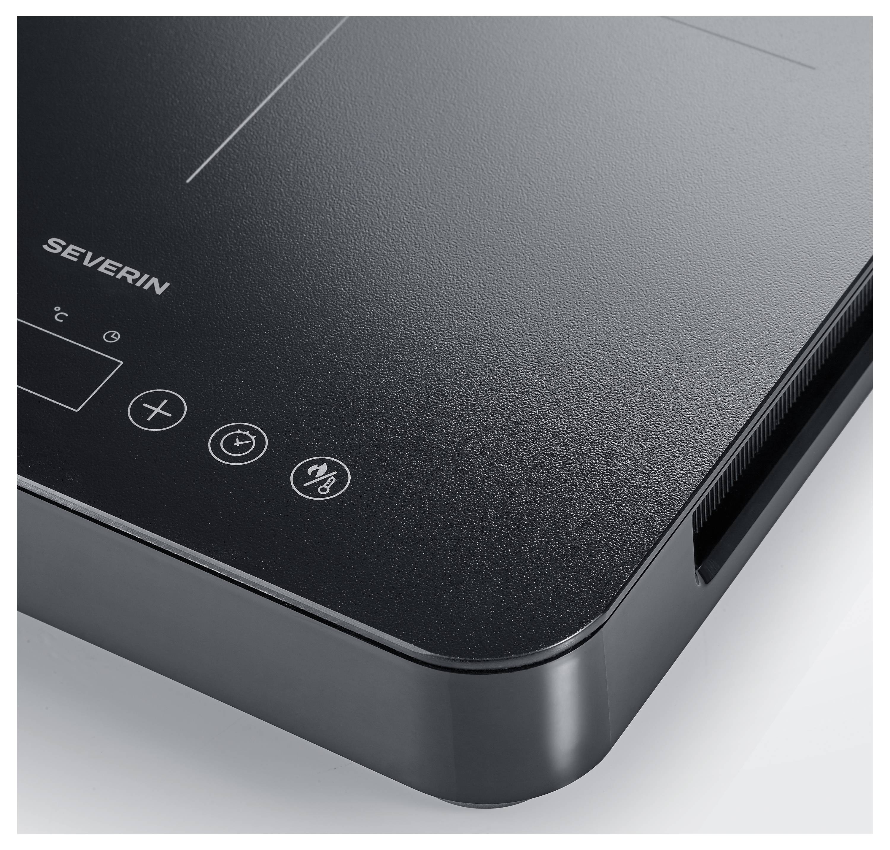 A black Severin induction cooktop with digital touch controls, featuring plus, minus, and power icons on its surface.