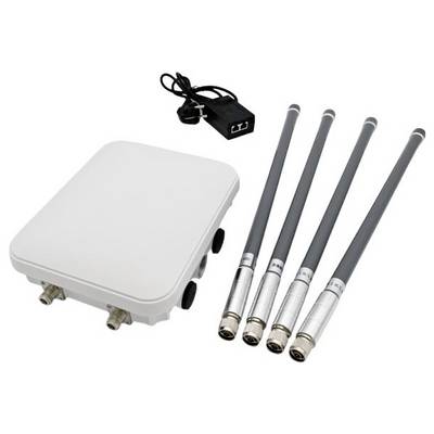 'A wireless communication device with a white rectangular unit, four antennas, and a black power adapter.'