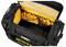 An open black and yellow tool bag showing various pockets and compartments, designed to organize tools efficiently.