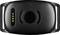 A black electronic device with symmetrical design, featuring a circular center, three dots on the right, and four gold contacts on the left.