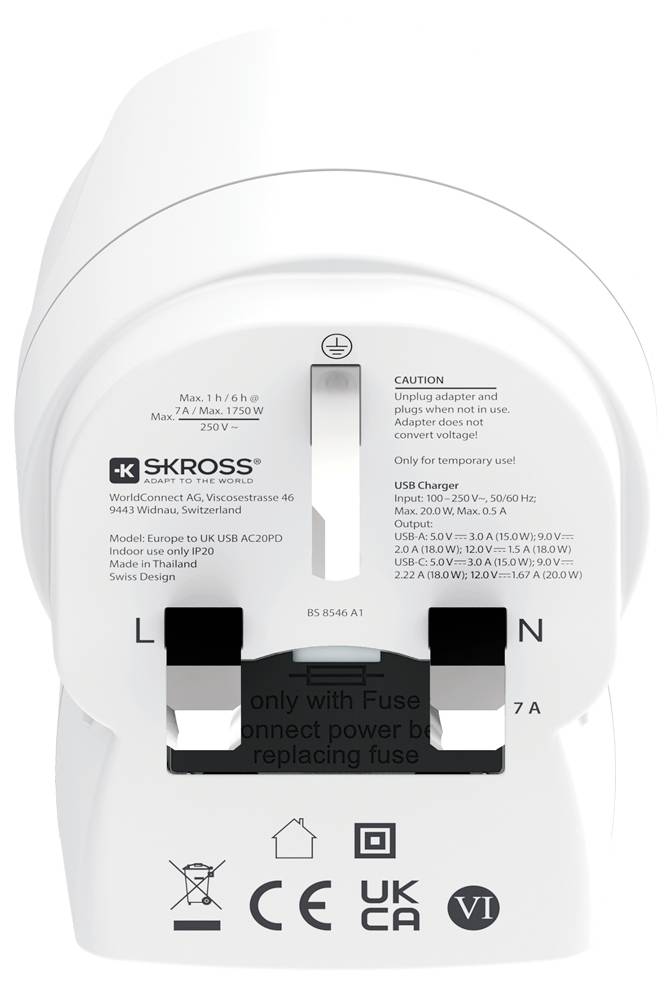 'SKROSS travel adapter showing plug pins, voltage specifications, safety warnings, and compliance symbols. Compatible with various regions.'