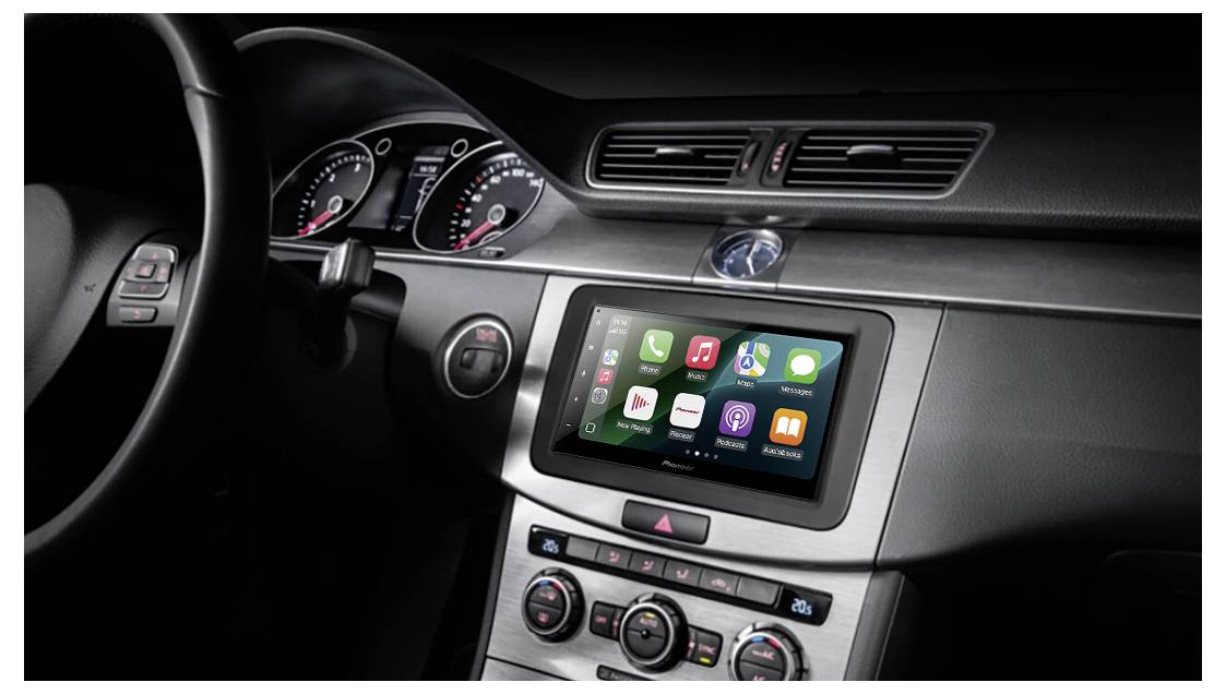 Car dashboard featuring a central touchscreen display with smartphone app icons, including navigation and music, integrated with vehicle controls.