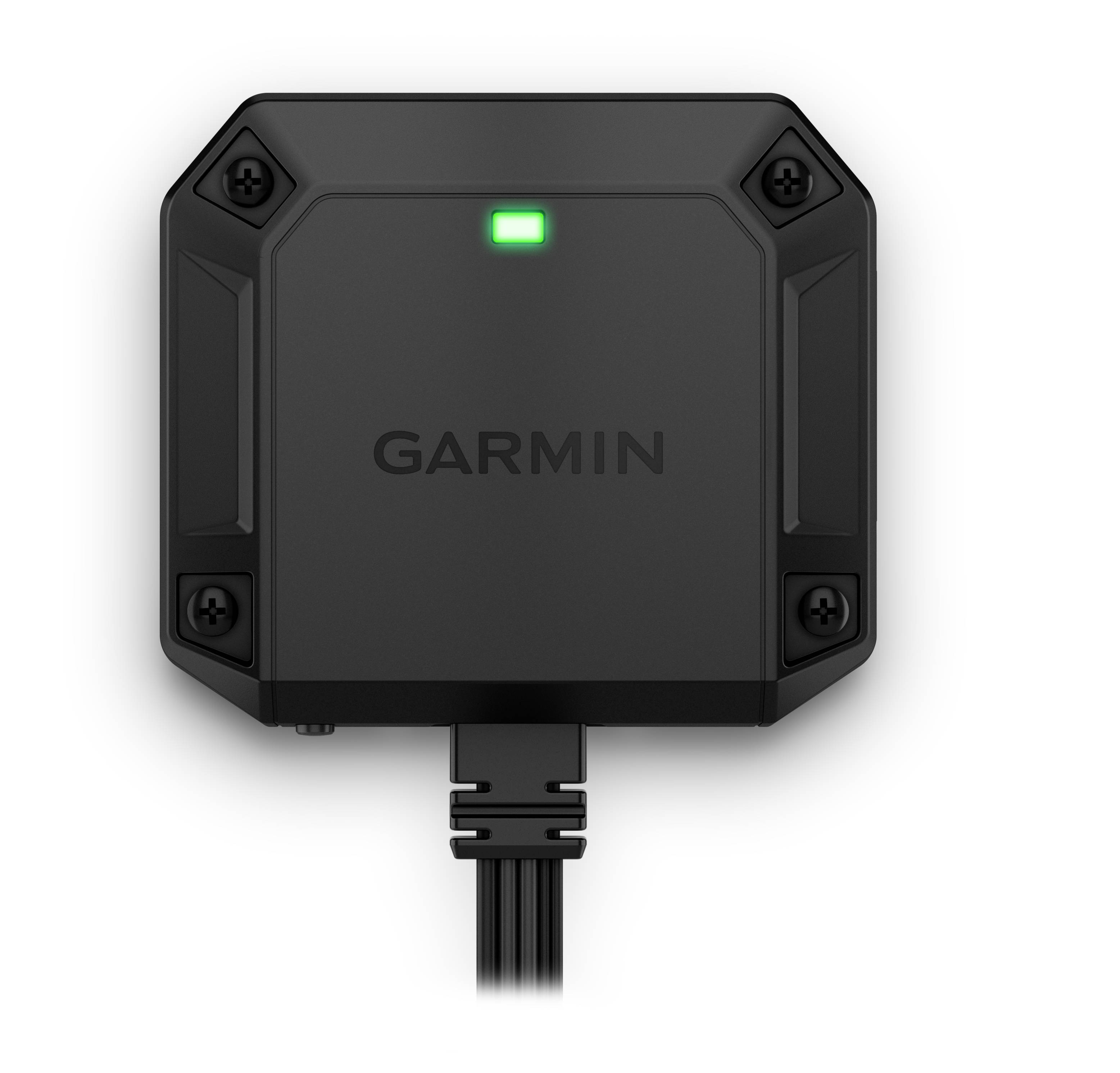 A black Garmin device with a glowing green light on top, indicating power or connectivity, mounted with visible screws.