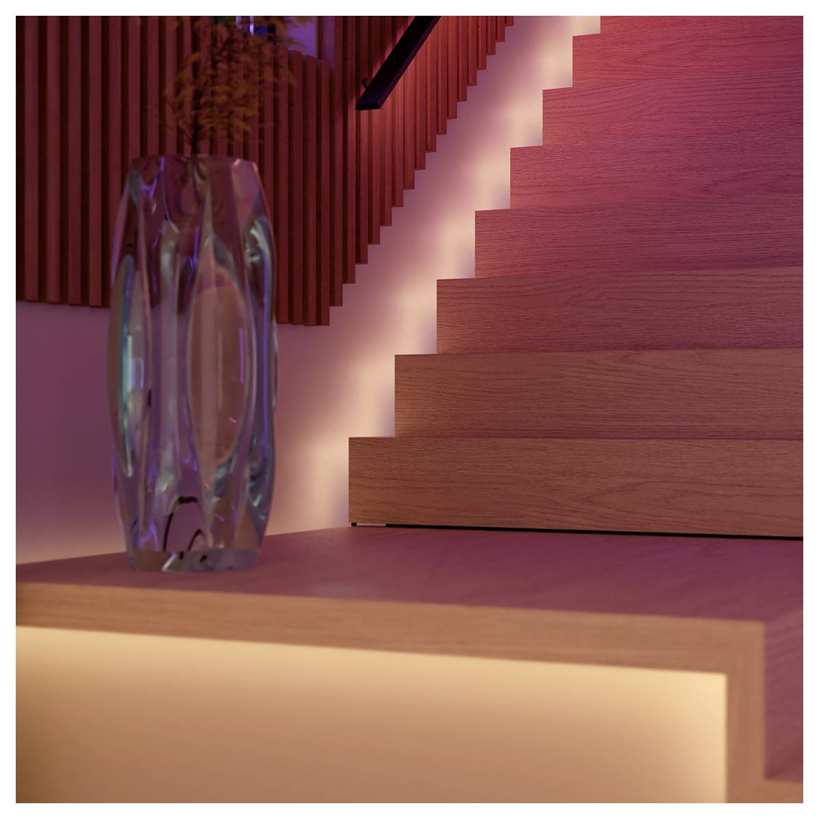 'Wooden stairs with modern glass vase and soft pink lighting, creating a warm, contemporary ambiance.'