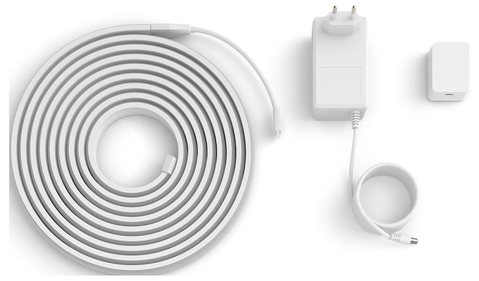 Coiled smart LED light strip with power adapter, connector pieces, and control unit, designed for flexible and customizable lighting.