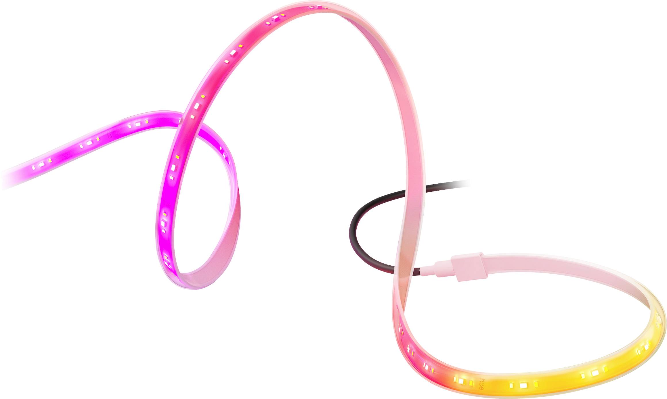 A flexible LED strip light emits various colors, including pink and orange, creating an ambient and decorative lighting effect.