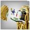 A LEGO figure with a blue hoodie jumps from a golden apple structure, holding a golden trophy.