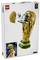 LEGO set featuring a model of the FIFA World Cup trophy with the trophy appearing to open, revealing a mini soccer field inside.