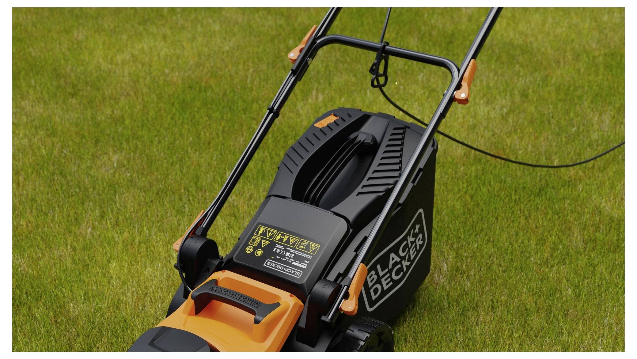 A close-up of a 'Black & Decker' lawnmower on a grassy lawn, showing the handle and power settings, positioned for mowing.