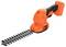 An orange and black cordless handheld hedge trimmer by Black & Decker, featuring a compact design with sharp, dual-action blades.