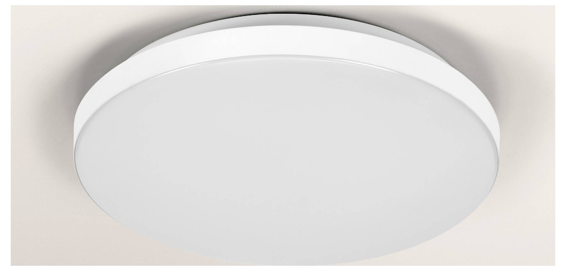 A round, modern ceiling light fixture with a smooth, white finish, mounted on a white ceiling.
