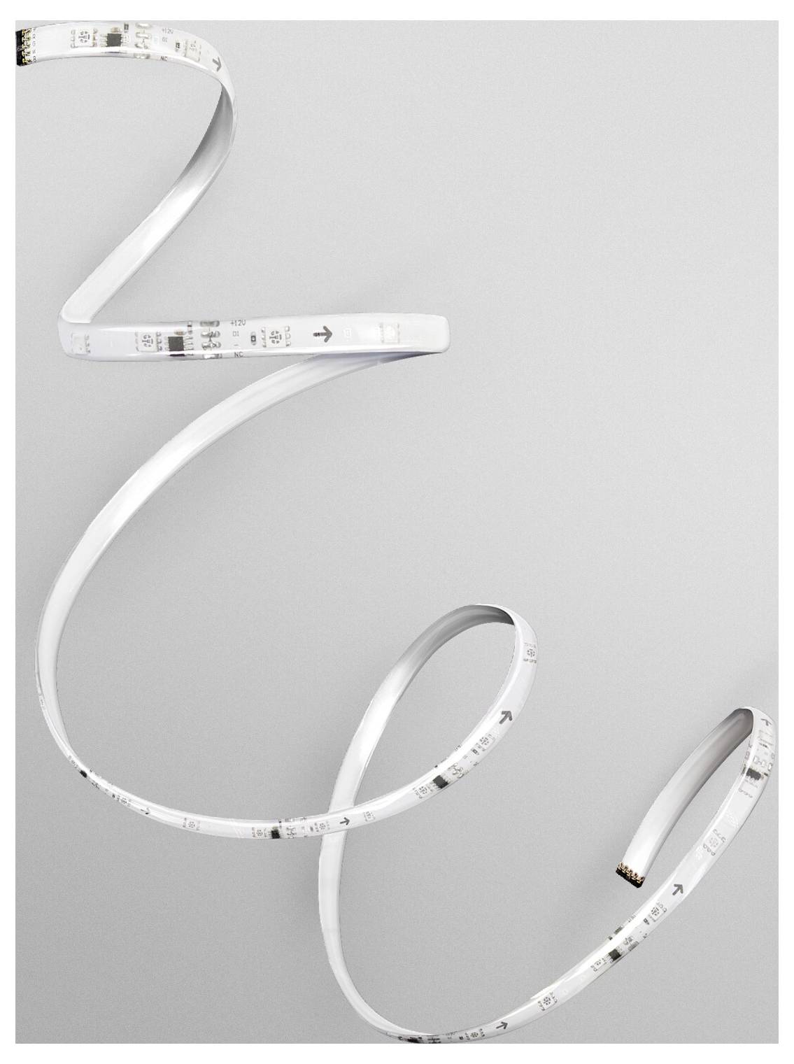 A coiled white LED strip light on a gray background, showcasing its flexibility and design.