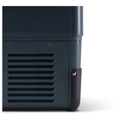 Close-up of a dark vented metal appliance or equipment cabinet corner with a black handle on the right side.<br>