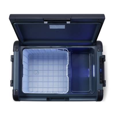 Open portable cooler or refrigerator with a removable basket on the left and empty compartment on the right.