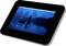 A tablet displays a blue dusk photo of a person fishing from a small boat on a calm lake with reflected silhouettes.