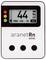 'Radon measurement device aranetRn one with display showing: 44 Bq/m³. Coloured LED indicators visible on the left and three control buttons at the bottom.'