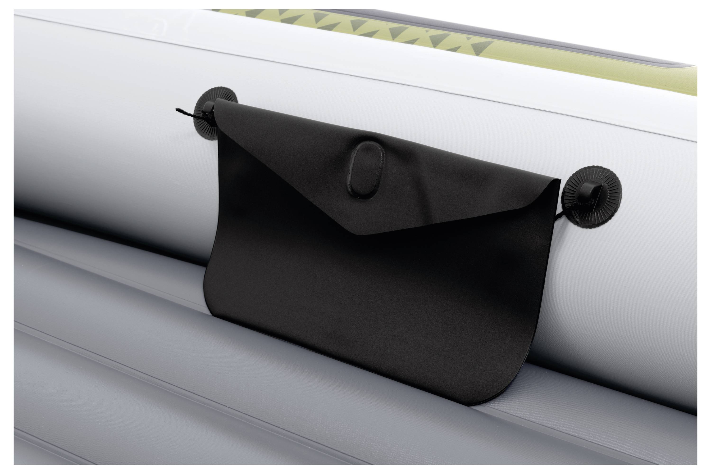A black storage pouch attached to the side of an inflatable boat, hanging securely by two clips.