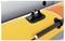'Close-up of a yellow inflatable boat with a black handle and oar attachment.'