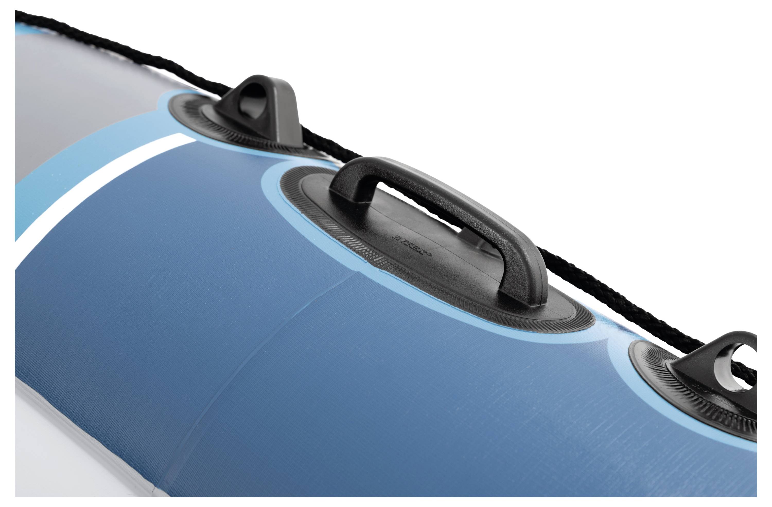 A close-up of handles on a blue inflatable boat, showing details of the grip and texture.
