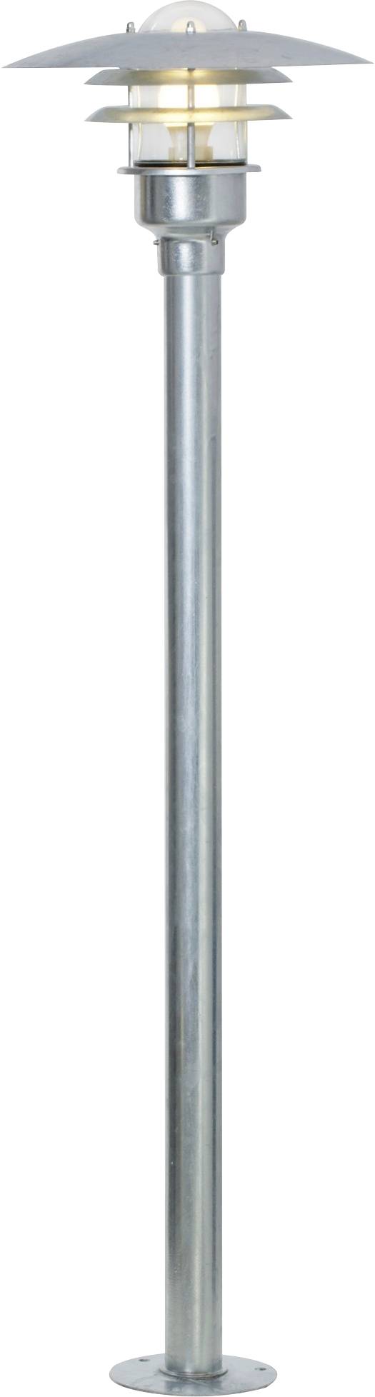 A tall, modern outdoor street lamp with a metallic finish and layered shade design, emitting a warm light from its bulb.