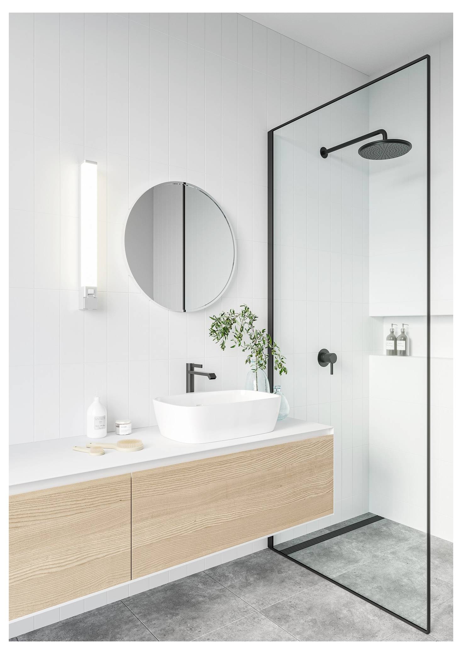 Modern bathroom with a round mirror, wall-mounted light, floating wood vanity with a white sink, and a glass shower enclosure.