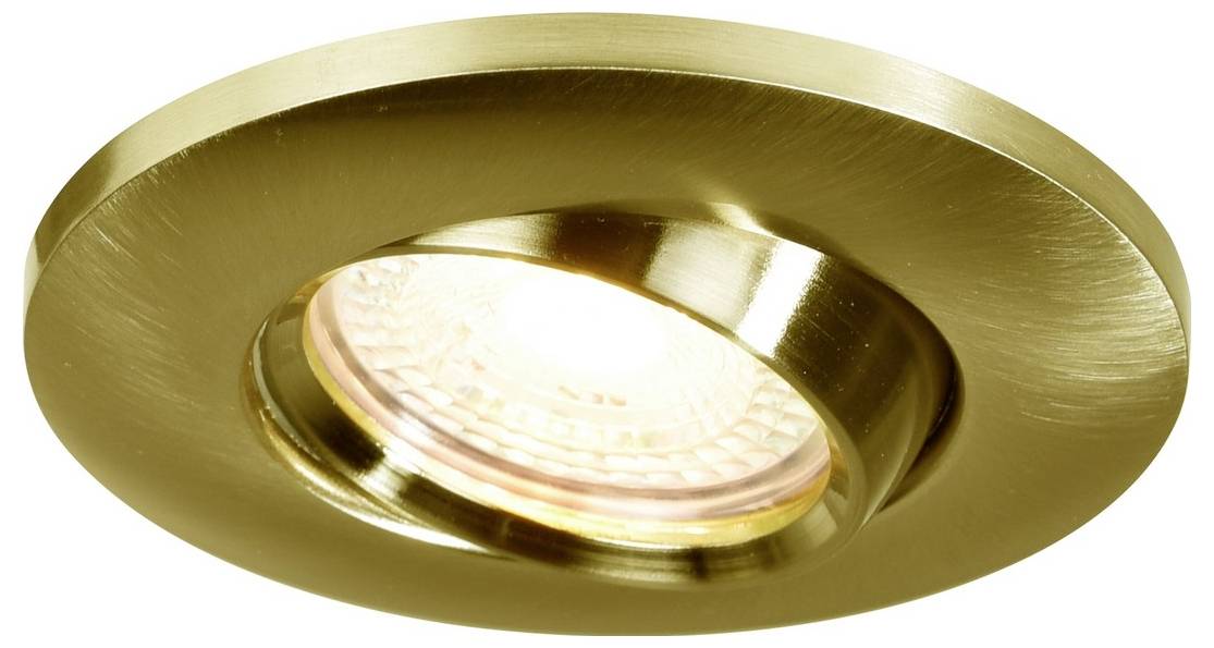 A brass-colored recessed ceiling light fixture with a glowing bulb.