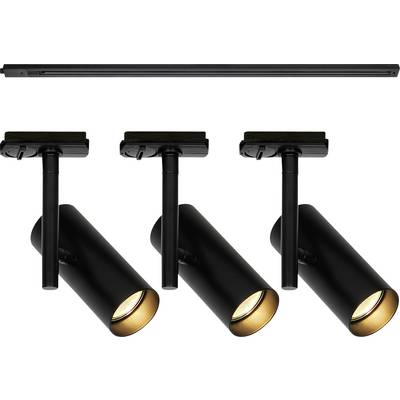 A set of four black track lights with cylindrical heads, positioned on a slim black track. Lights are angled to direct illumination downward.