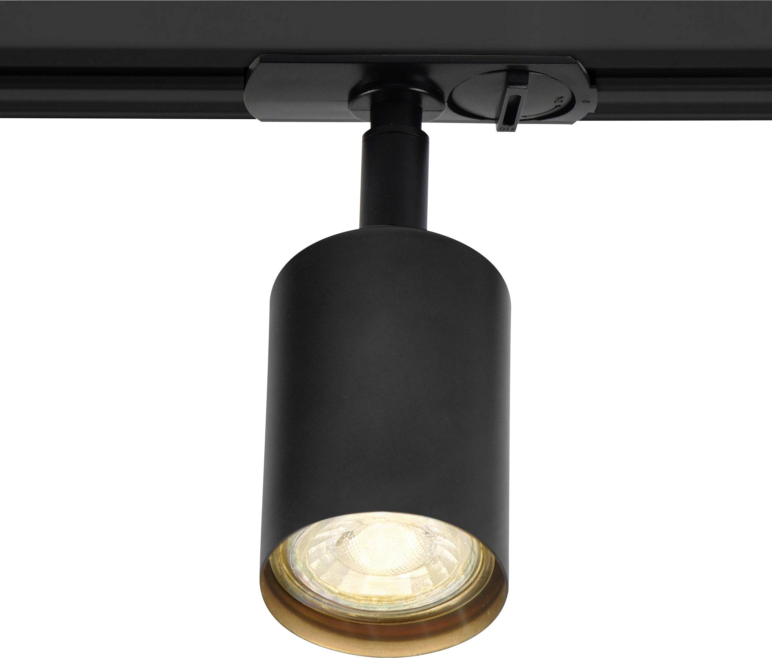 A black track light fixture with a cylindrical light housing is mounted on the ceiling, designed for targeted lighting in interior spaces.