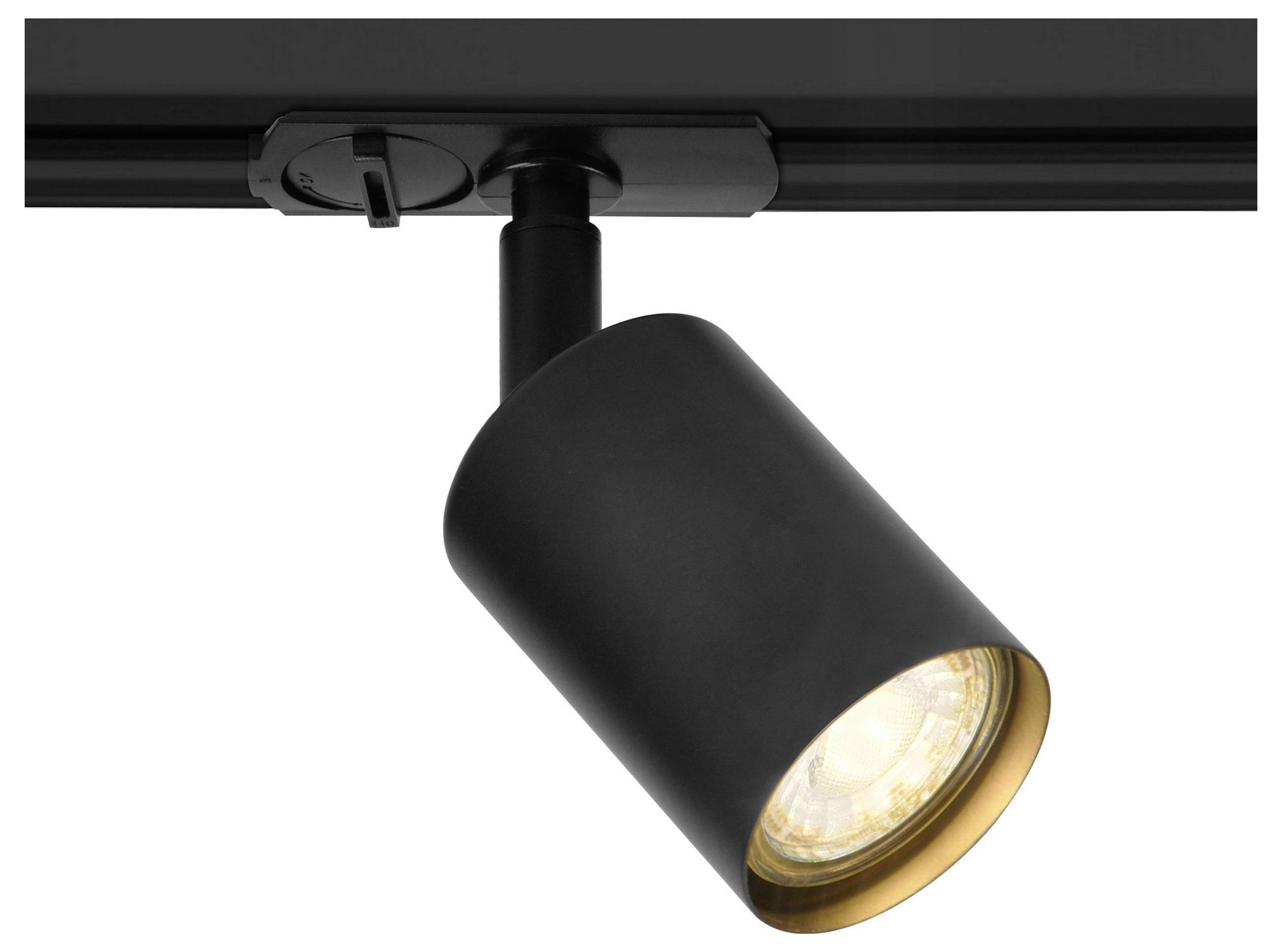 A black track light fixture with a cylindrical head, emitting warm light, mounted on a dark track against a neutral background.